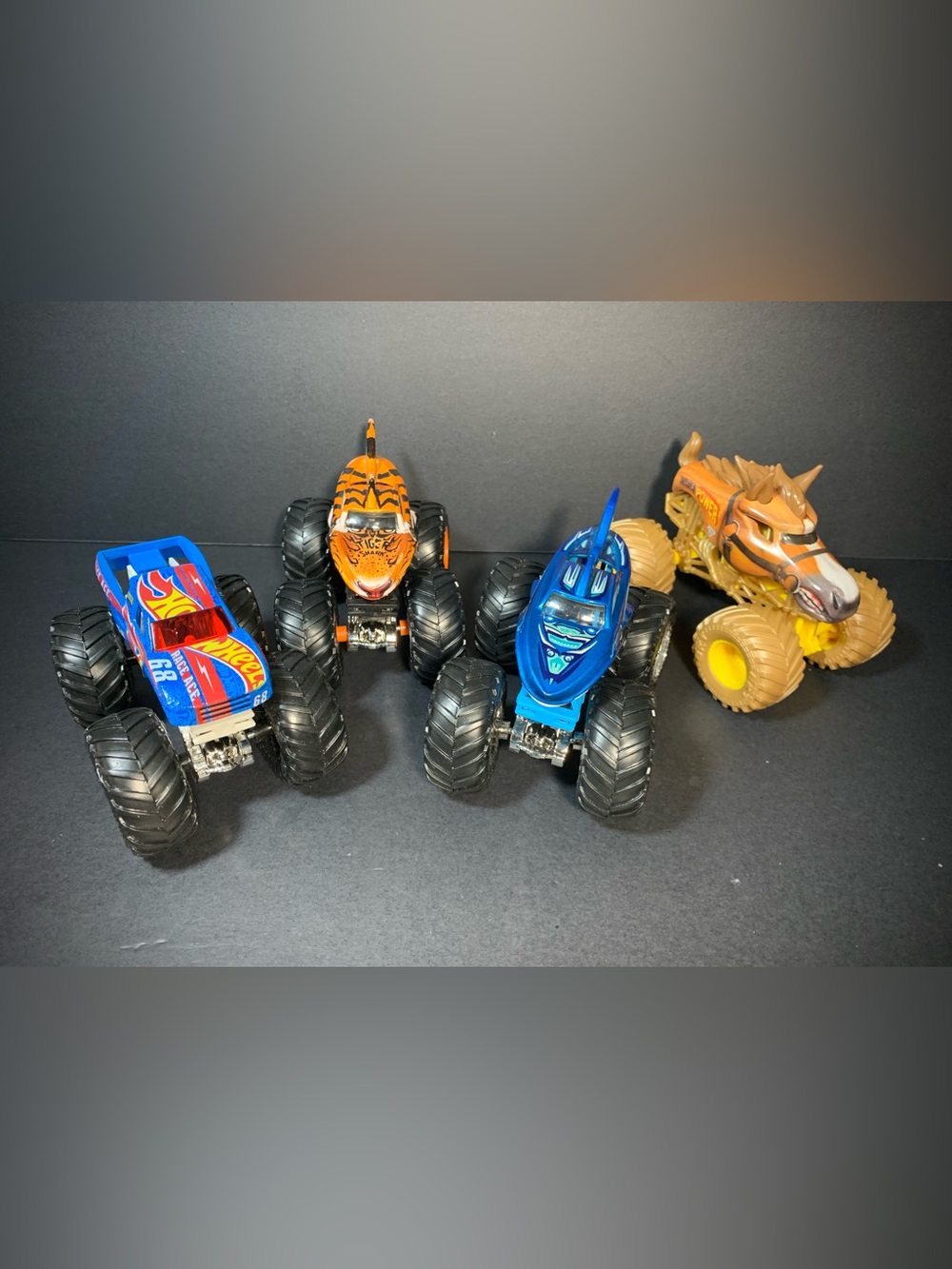 Lot of 4 Monster JAM Trucks – Hot Wheels, Horse Power, Tiger Shark